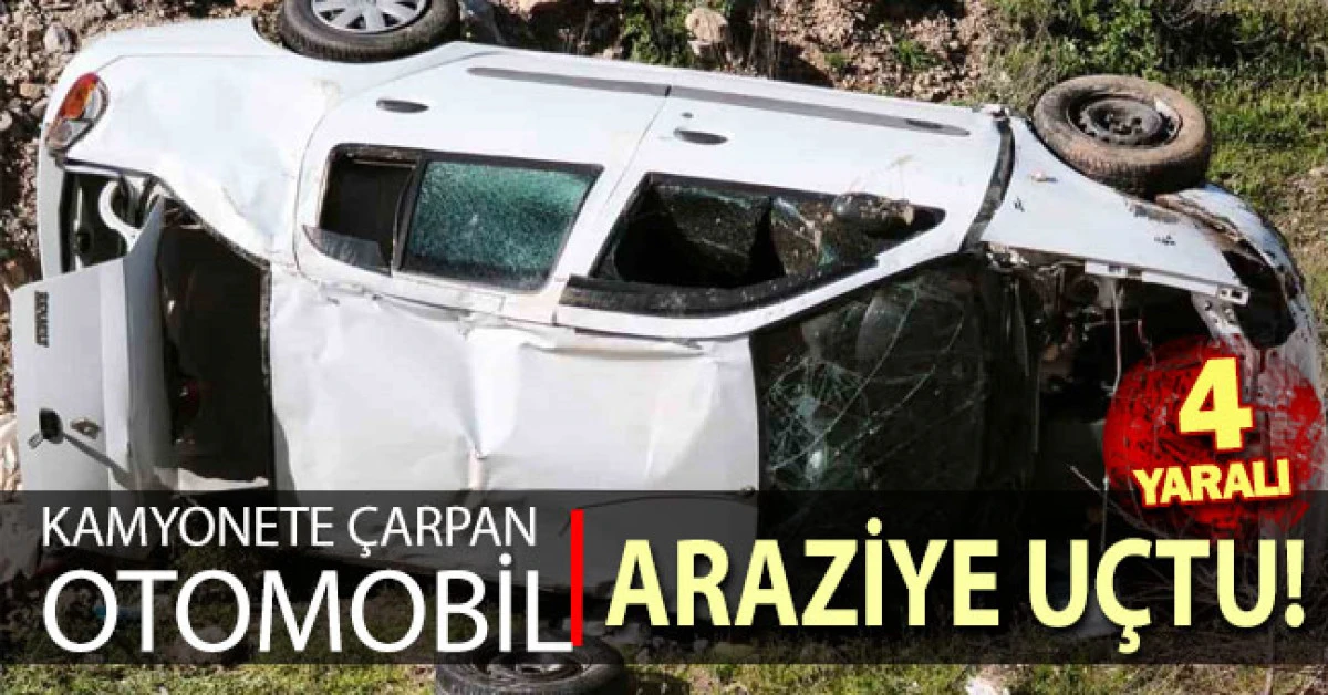Emniyet şeridindeki kamyonete &ccedil;arpan otomobil boş araziye u&ccedil;tu: 4 yaralı