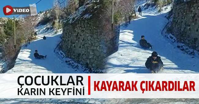 Kar yağışının keyfini kayarak çıkardılar