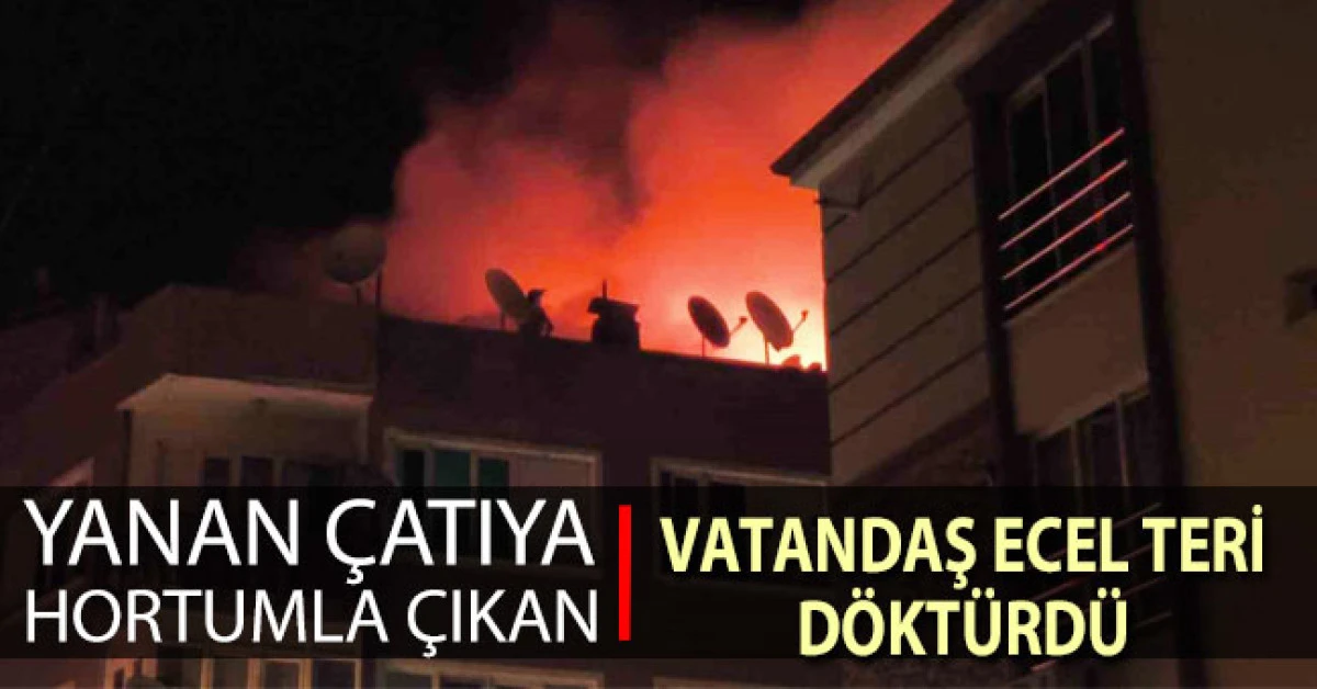 Yanan &ccedil;atıya hortumla &ccedil;ıkan vatandaş mahalleliye ecel terleri d&ouml;kt&uuml;rd&uuml;